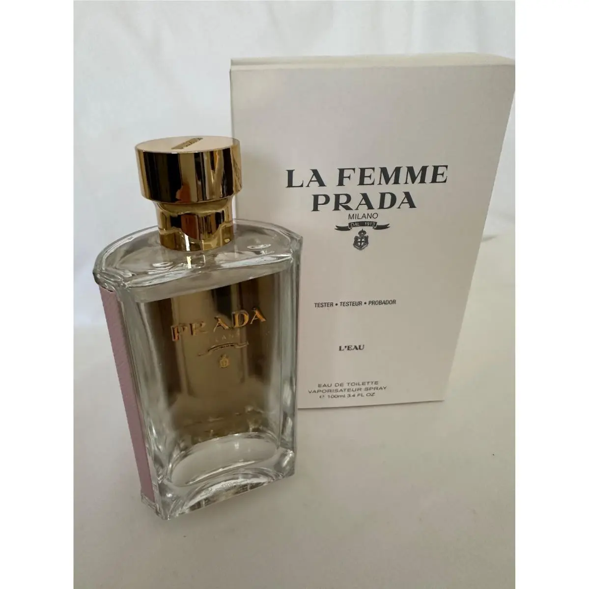 LA Femme L`eau by Prada 3.4 oz/100 in Edt Read Descriptipn