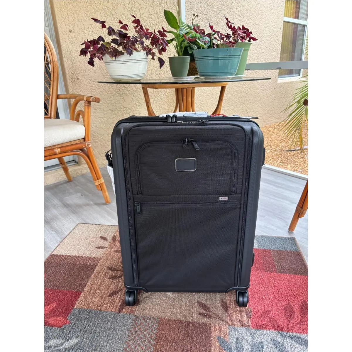 Tumi Alpha 26 Short Trip Expandable 4 Wheel Packing Case Color: Black