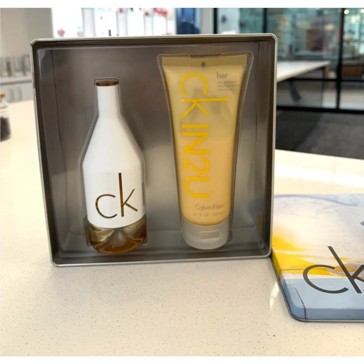 CK IN2U For Her  3.4 Oz Edt + 6.7 Oz Moisturizer Gift Set by Calvin Klein