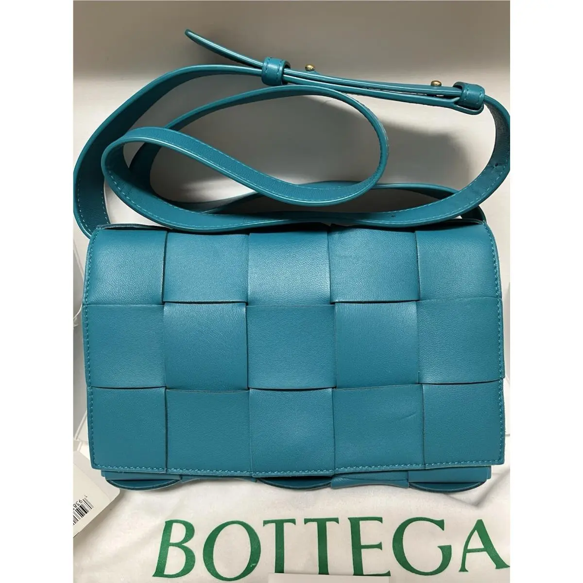 Bottega Veneta The Casette Intreccio Leather Crossbody Bag Blaster Gold