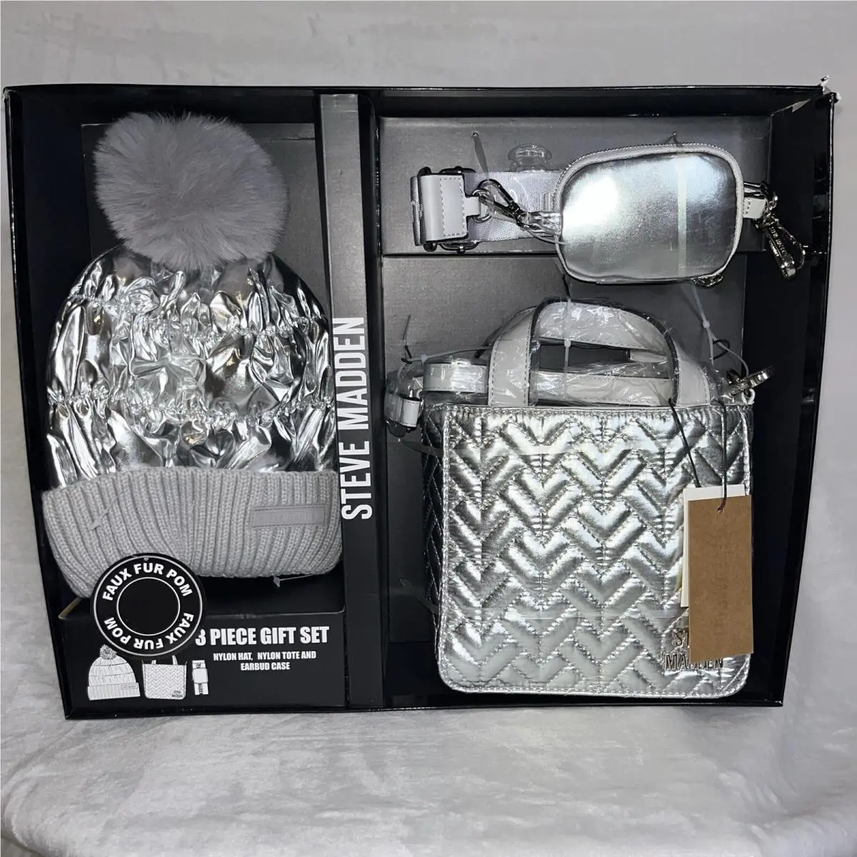 Steve Madden 3 Piece Gift Set Silver Crossbody Bag Tote Earbud Case and Hat