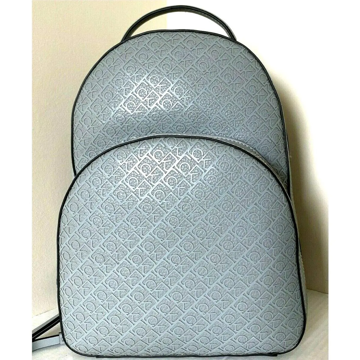 Calvin Klein Estelle Debossed Monogram Logo Backpack Grey