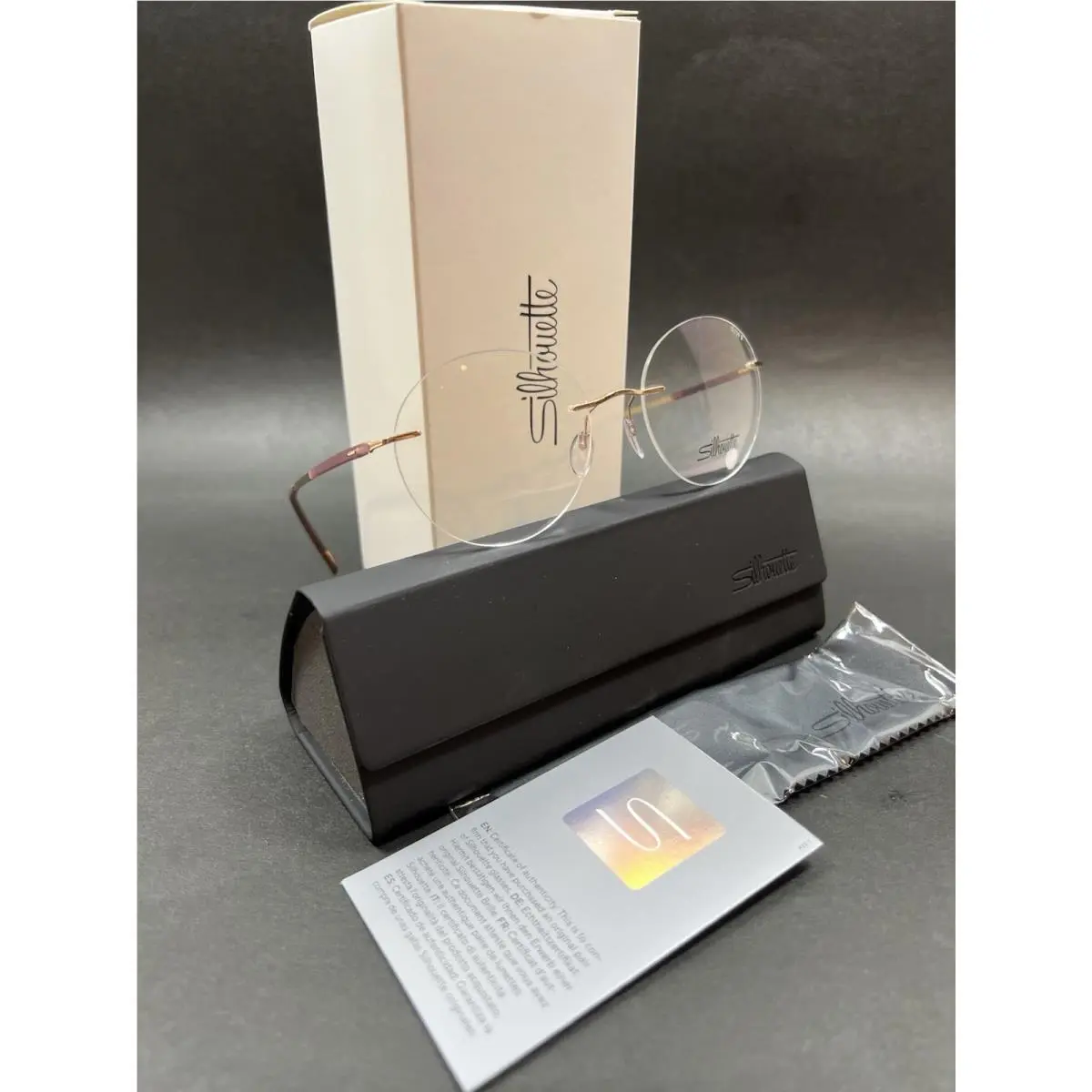5540 IO 3530 Sundown Rimless Titanium Eyeglasses 54-19-135 by Silhouette