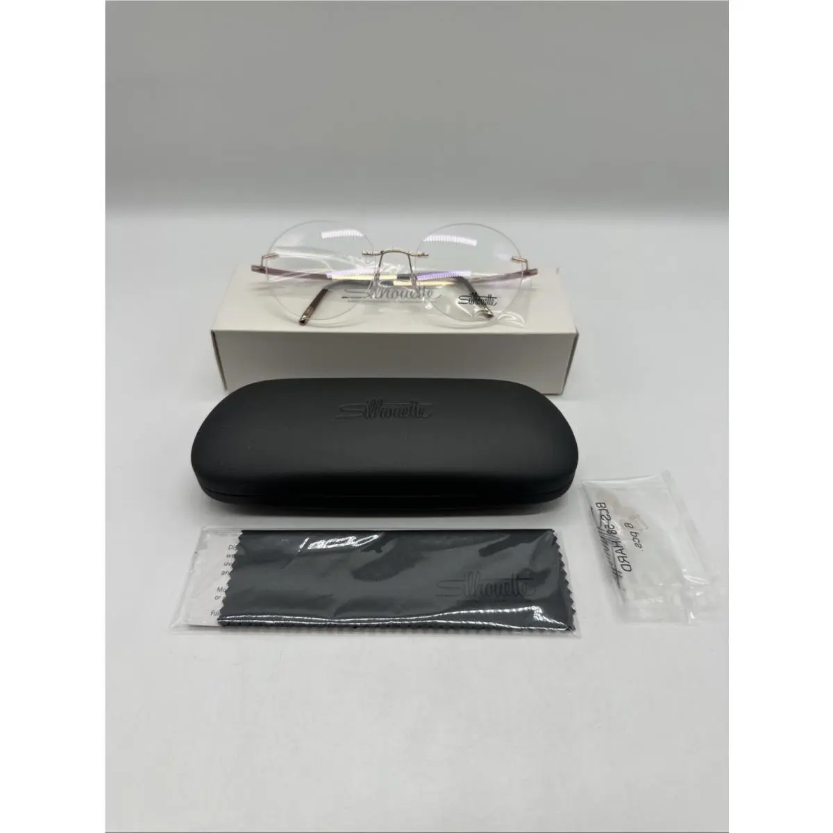 Silhouette 5540 IO 3530 Sedma Rimless Titanium Eyeglasses 54-19-135