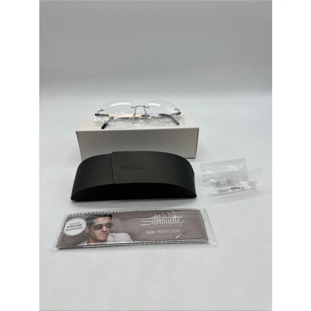 Silhouette 5555 CV 7630 Gold Navy Womens Oval Rimless Eyeglasses 52-15-135
