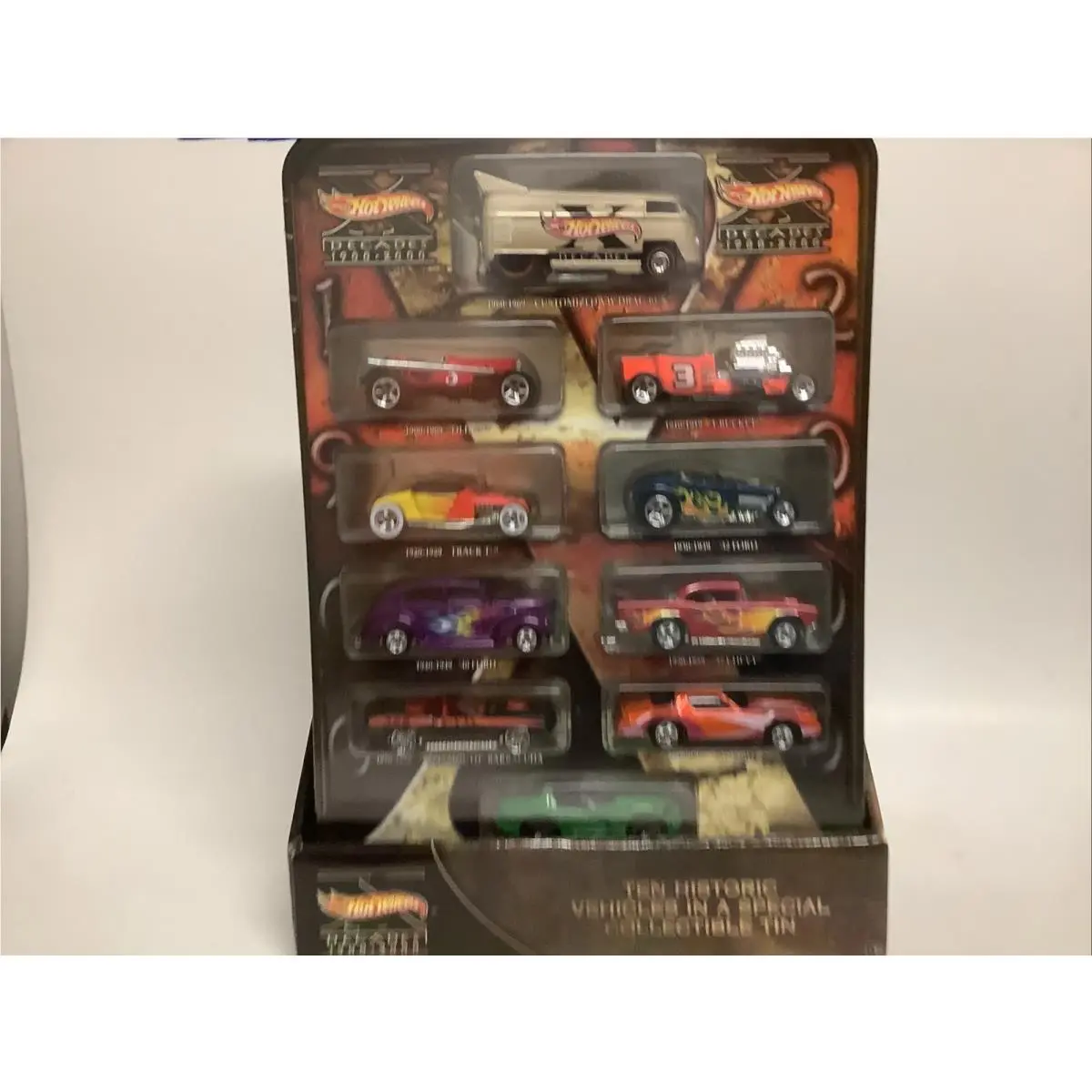 Hot Wheels Decades 1900-2000 Ten Vehicles Cars In Tin with Stand Box