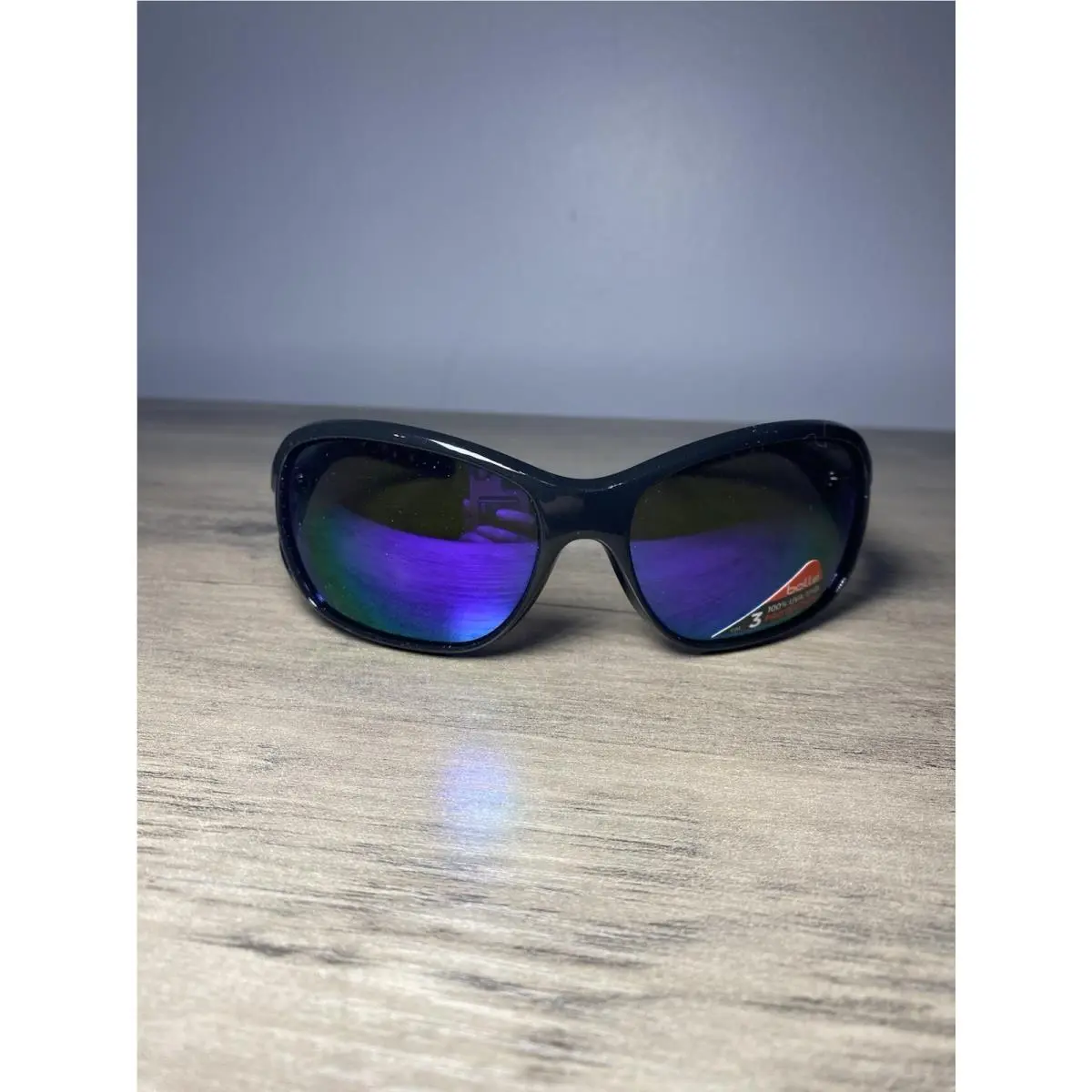 Solden Women`s Sunglasses Shiny Black with Blue Violet Mirror Lenses 11967 by Bolle