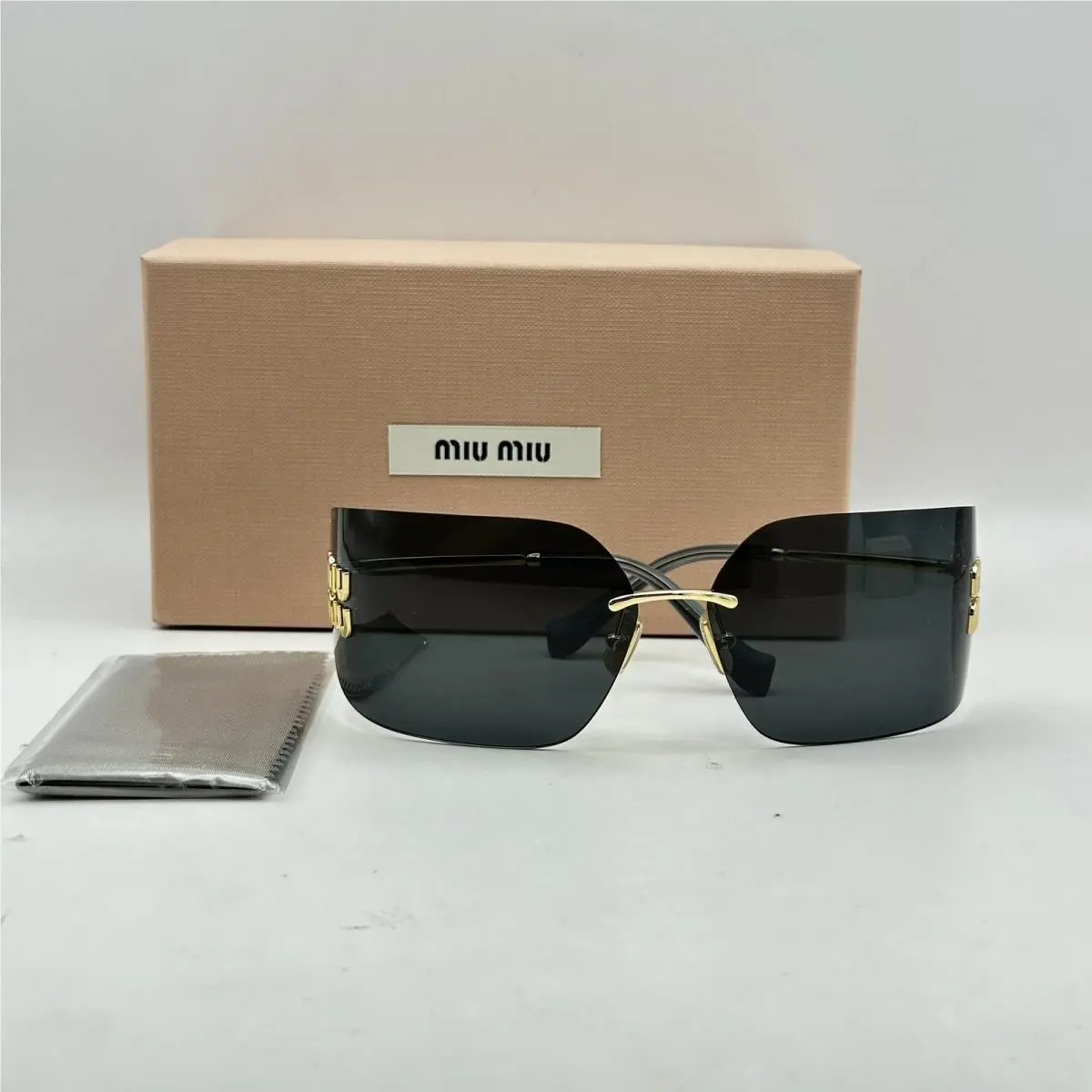 Womens Rimless Oversize Thin Metal Sunglasses MU54YS Gold/gray by Miu Miu