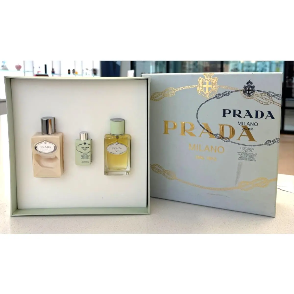 Infusion D`iris Prada 1.7 Oz Edp + 3.4 Oz Body Lotion + 0.27 Oz Mini Gift Set