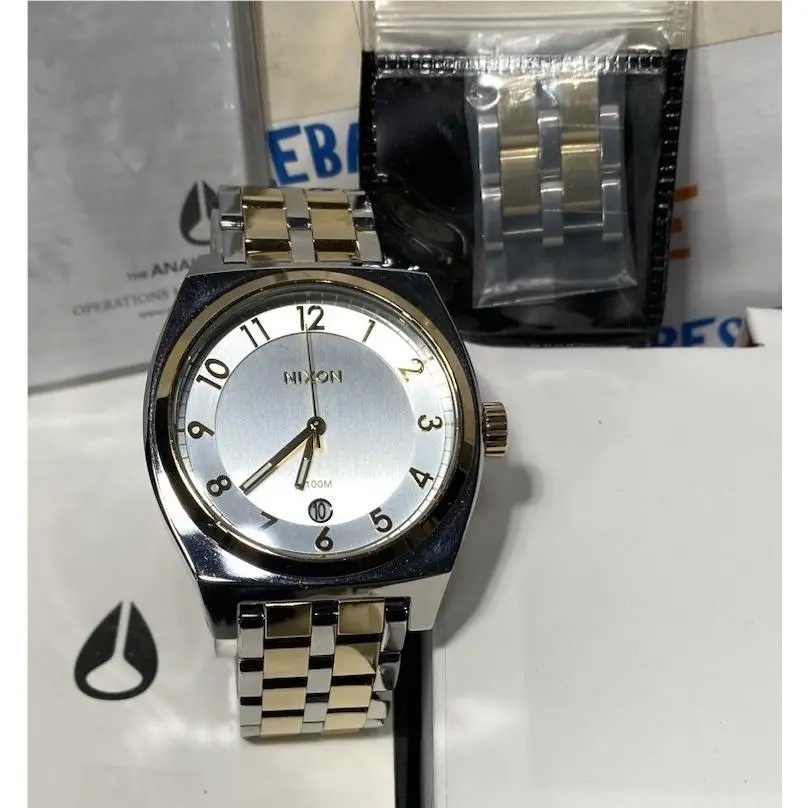 40MM Monopoly Silver / Champagne Gold Tone Date Watch A325 1431 by Nixon