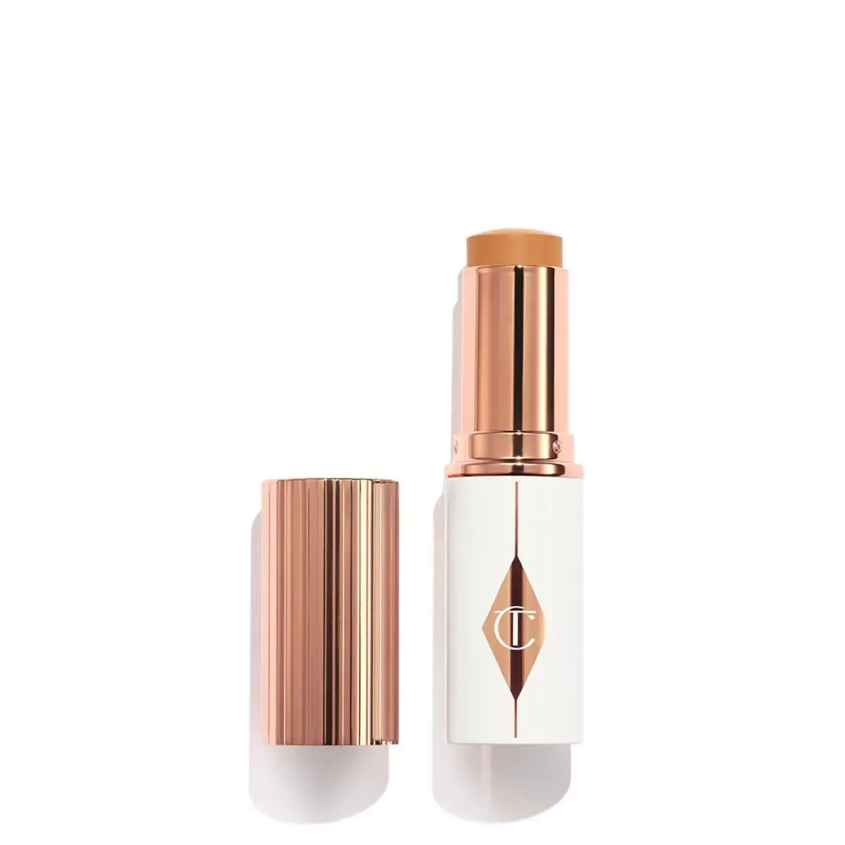 Charlotte Tilbury Unreal Skin Tint Sheer Glow Foundation Stick - 10 Tan