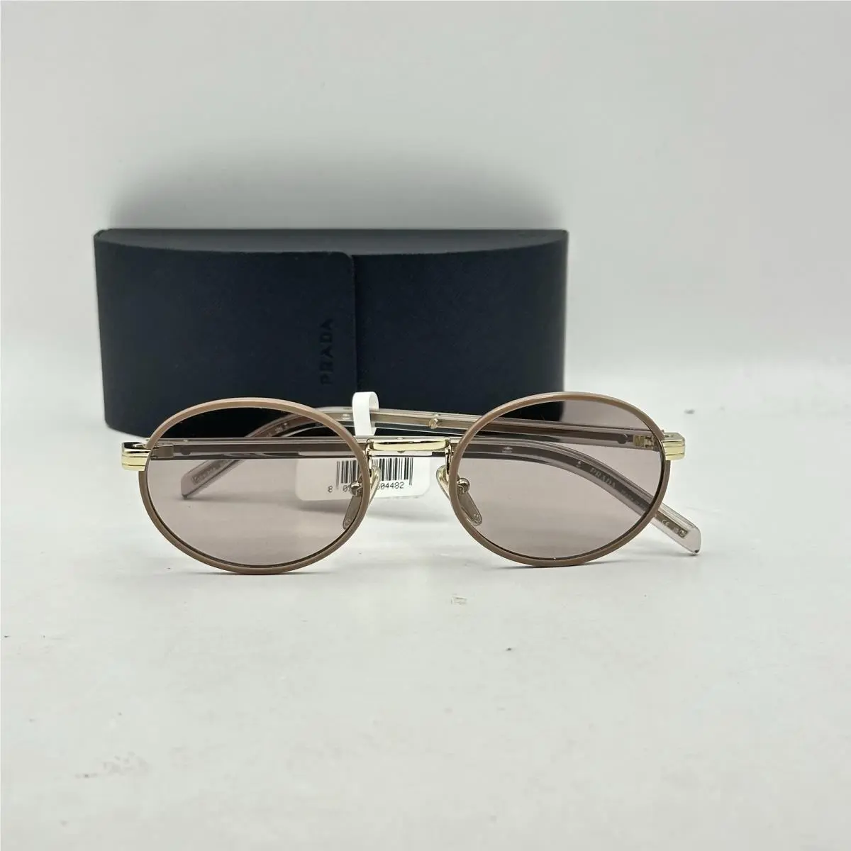 Prada Womens Oval Full Rim Sunglasses SPRB56 Brown