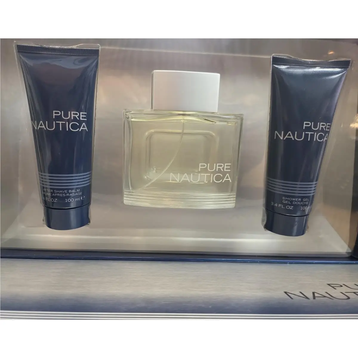 Pure  3.4 oz Edt Spray + After Shave + Shower Gel by Nautica