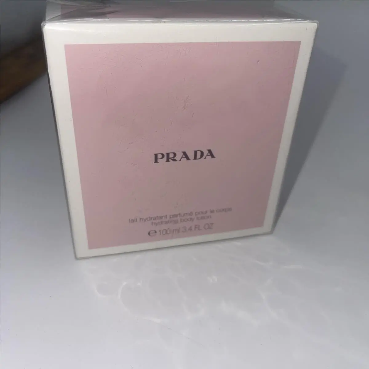 Prada Lait Hydratant Parfum Pour Le Corps Hydrating Body Lotion 3.4 Ounces