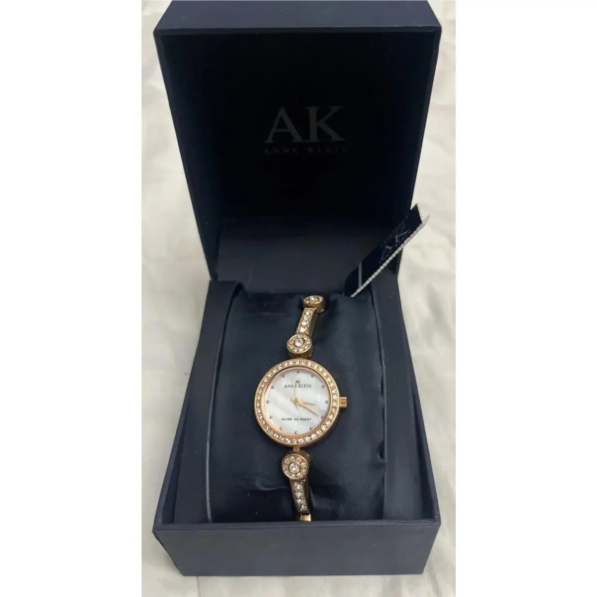 Anne Klein Women Swarovski Crystal Mother of Pearl Dial Rose Gold Bracelet Watch