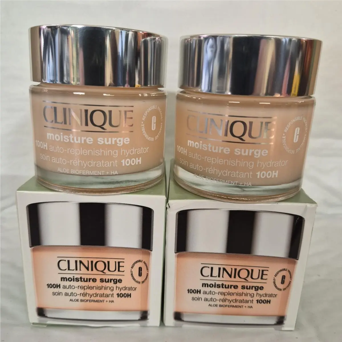2  Moisture Surge 100H Auto-replenishing Hydrator 2.5 OZ/75Ml by Clinique