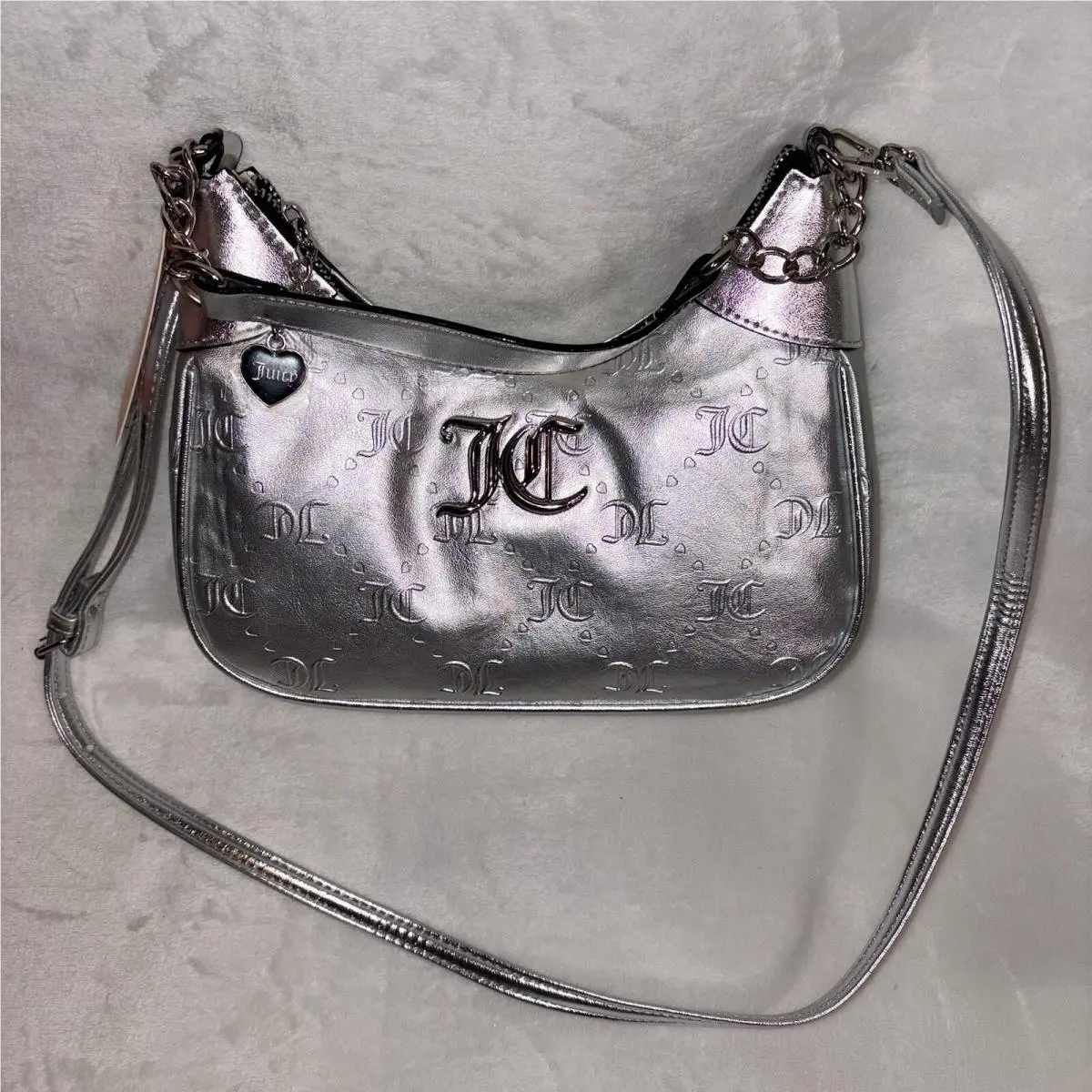 Juicy Couture Semi Charmed Hobo Style Crossbody Purse In Silver