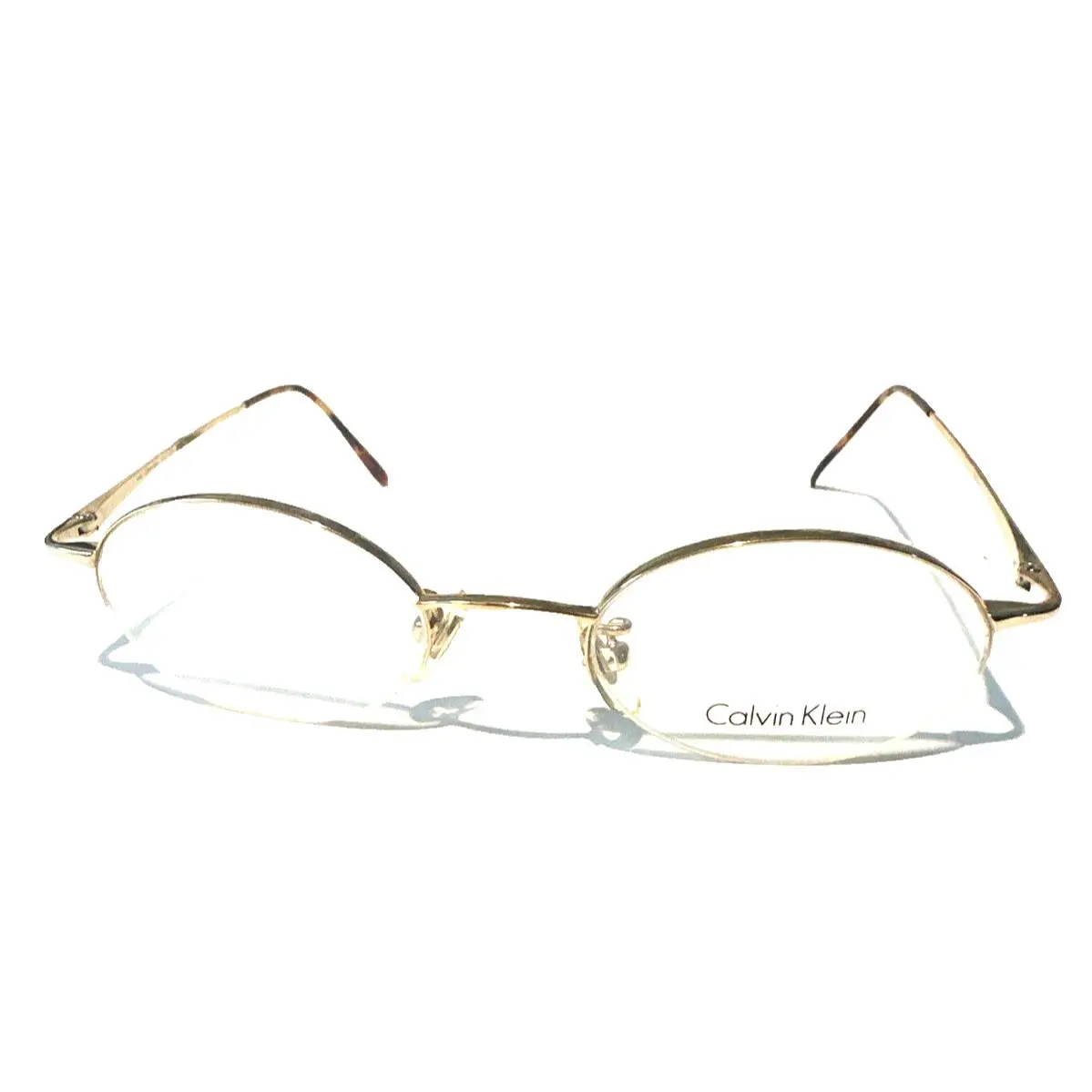 Old Stock Vintage Calvin Klein Eyeglasses Semirimless 343 Gold
