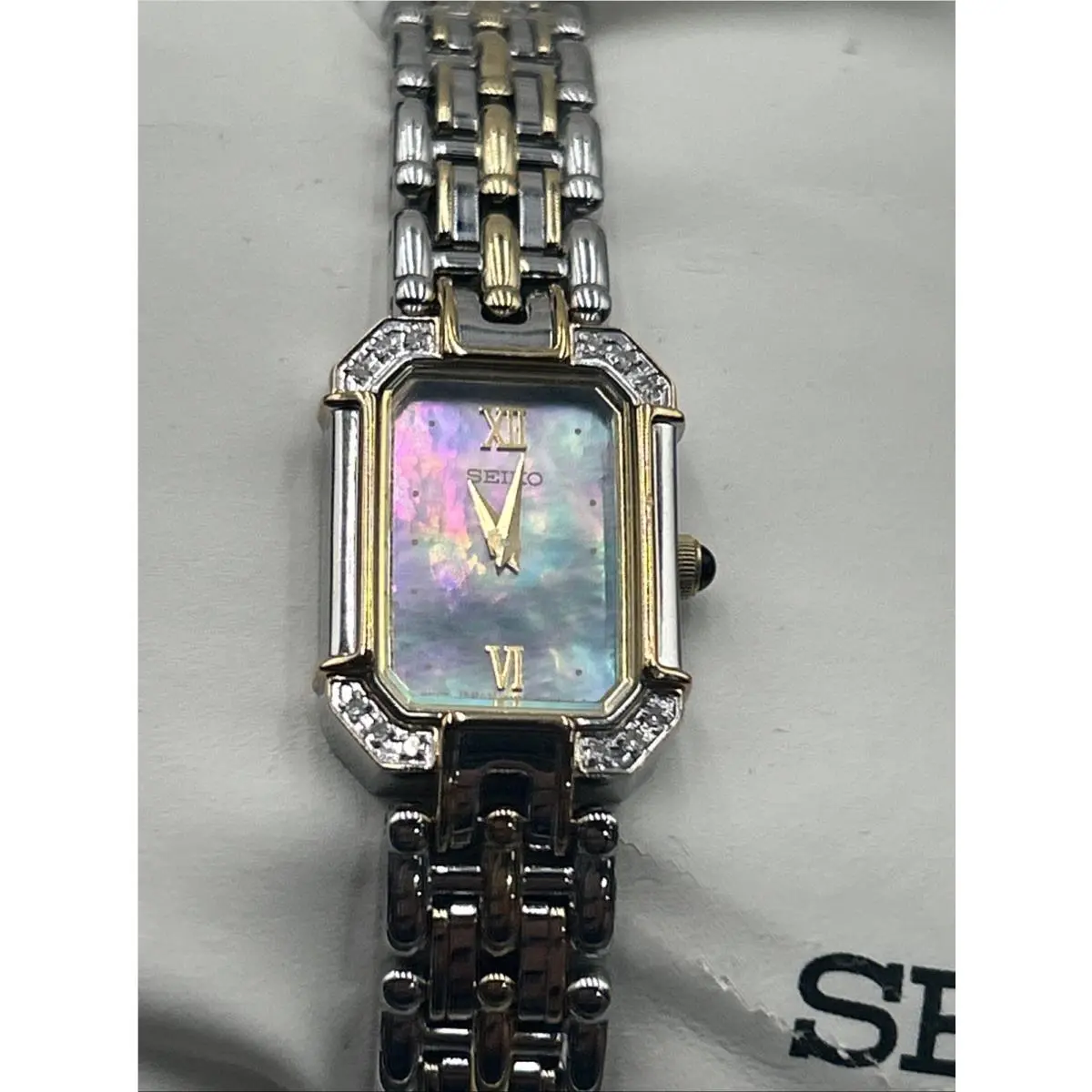 Women`s SUJE10 Dress Diamond Accented Bezel Blue Dial Two Tone Watch by Seiko