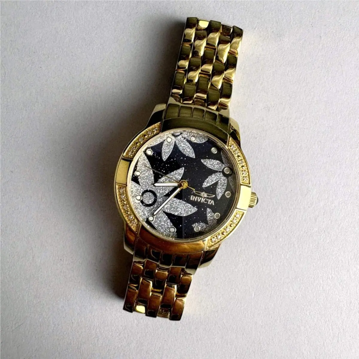 Invicta Womens Model 6371 Gold Tone Diamond Accent Floral Glitter Dial Watch