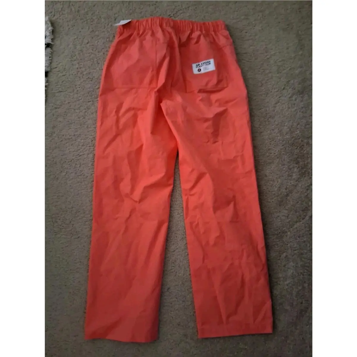 Nike clothing - peach (UPC: 196156385310) 0