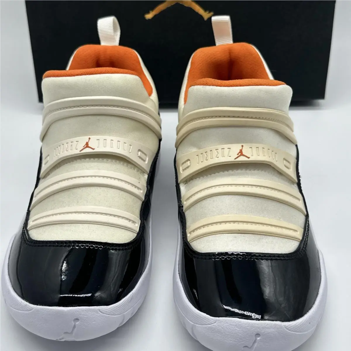 Nike shoes - Air Jordan 11 - Air - Black, White, Orange (UPC: 0193151910929) 0