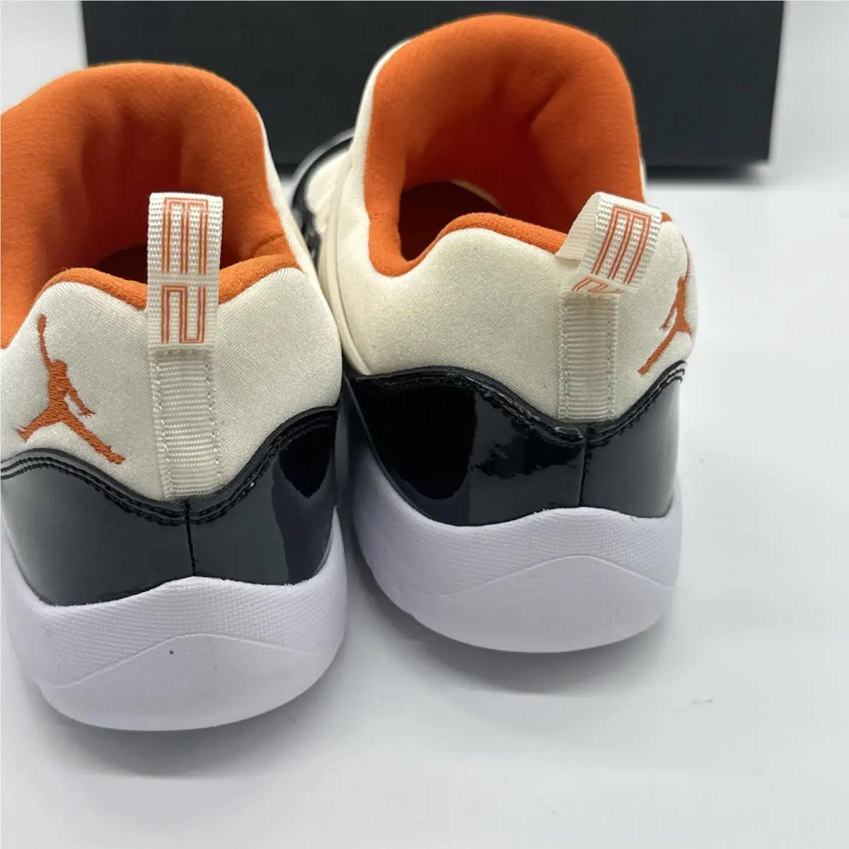 Nike shoes - Air Jordan 11 - Air - Black, White, Orange (UPC: 0193151910929) 3