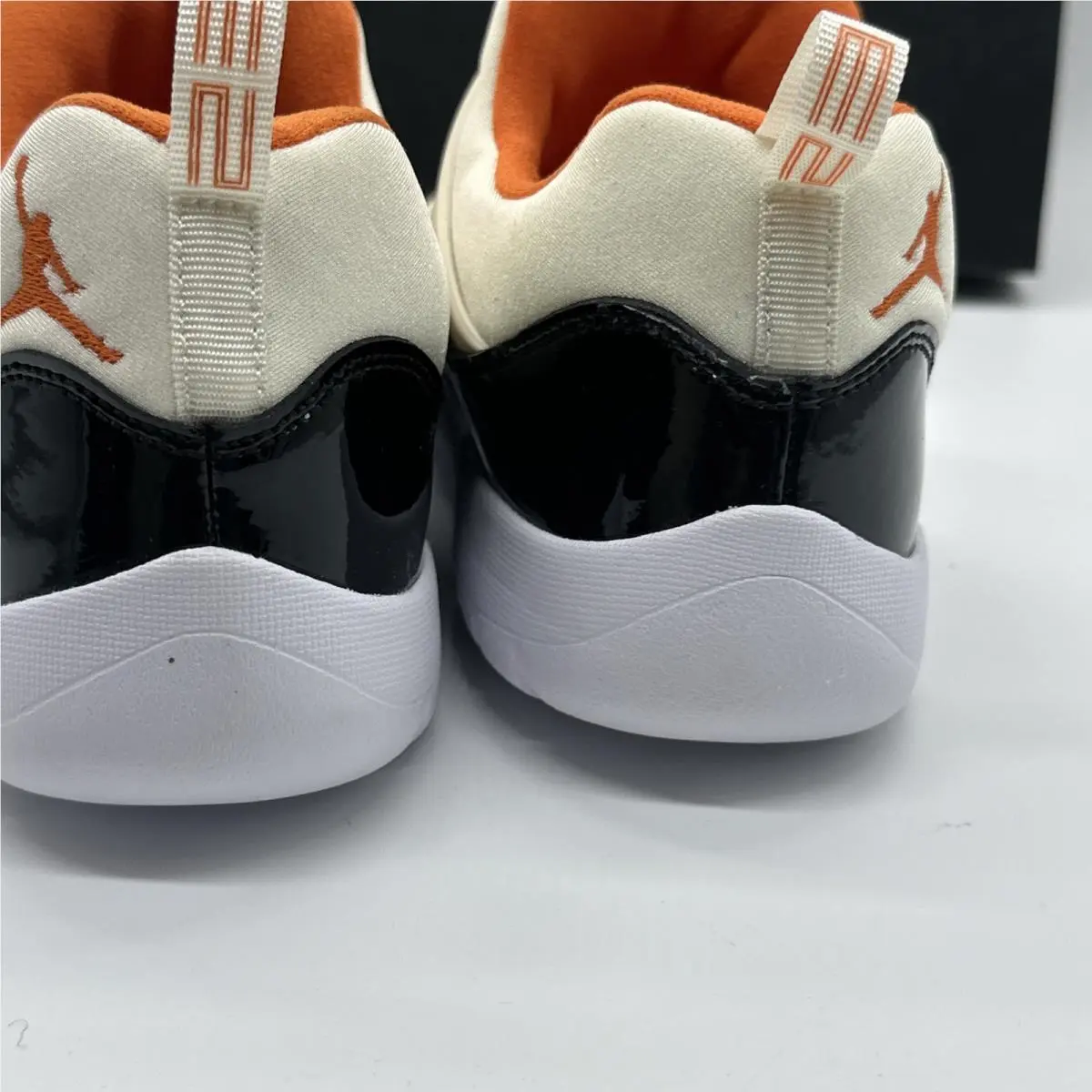 Nike shoes - Air Jordan 11 - Air - Black, White, Orange (UPC: 0193151910929) 4