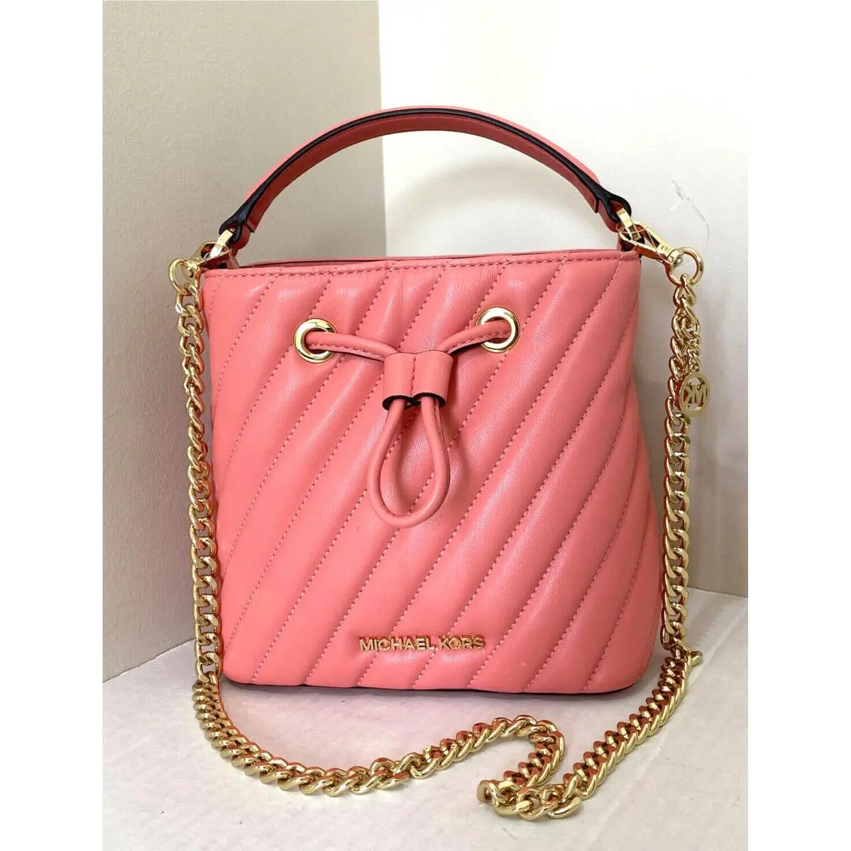 Michael Kors Small Suri Bucket Crossbody Vegan Leather Grapefruit / Dust Bag
