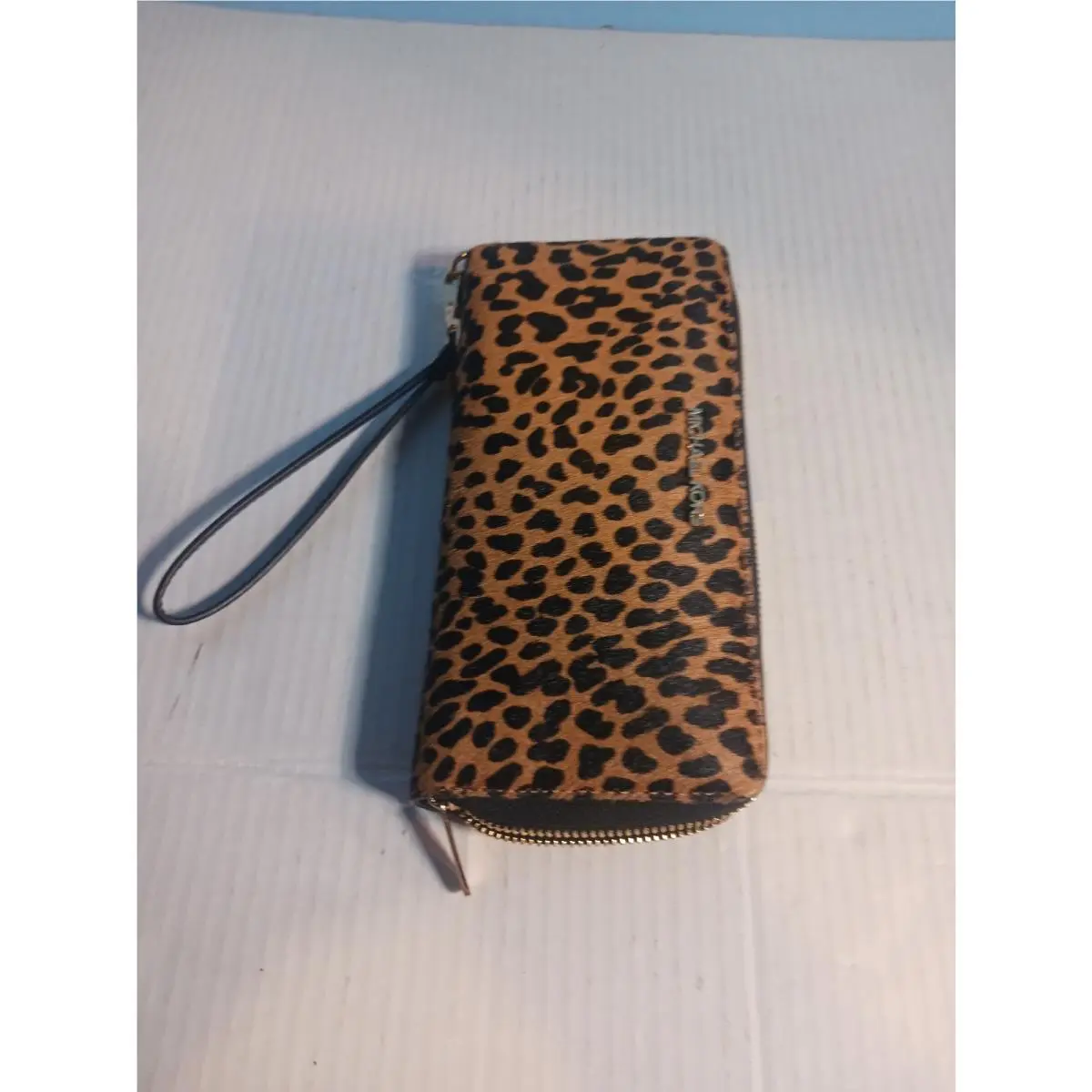 Michael Kors Brown/black Animal Print Leather Zip-around Wallet For Women