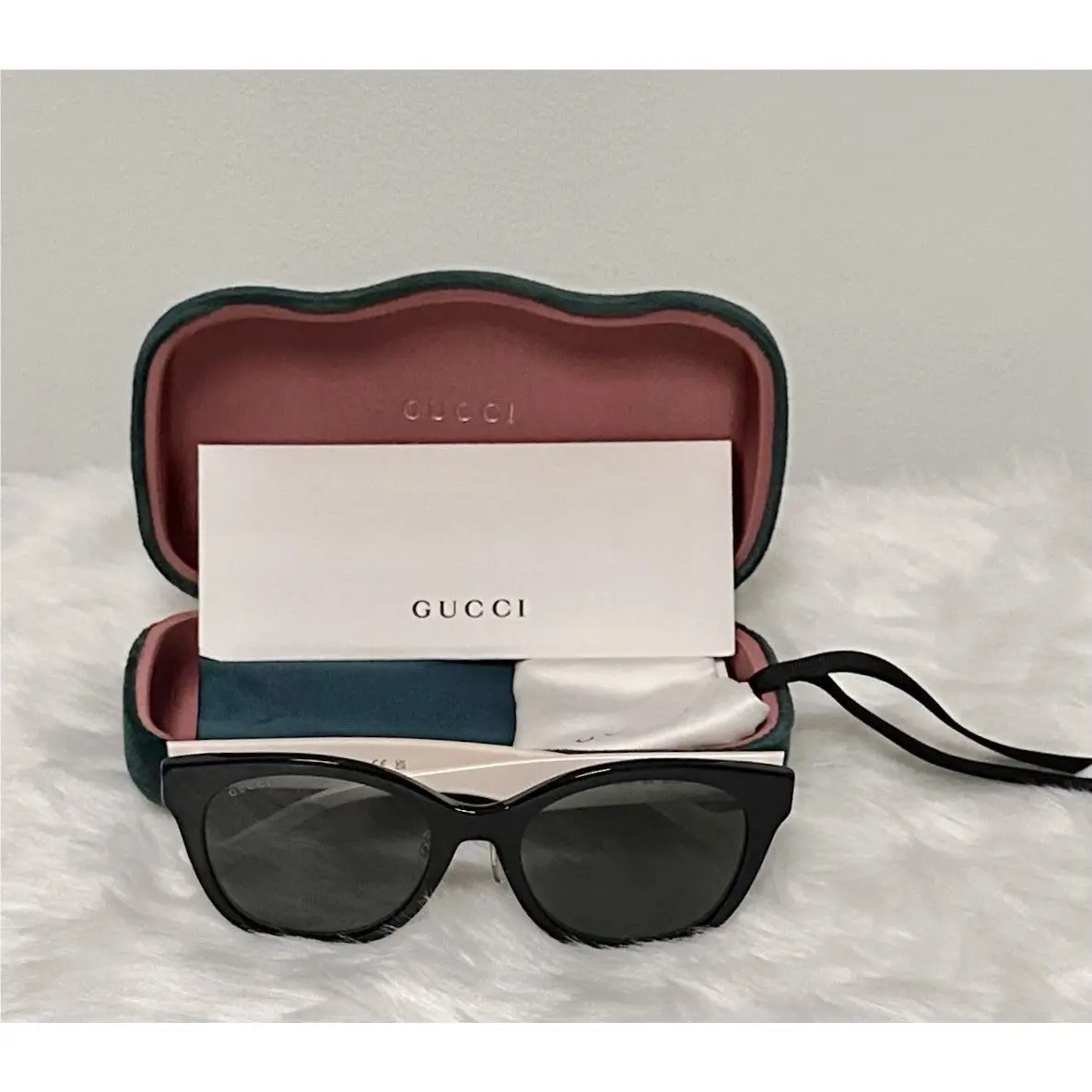 Women`s GG1002SK-004 Black Ivory White Frame Tinted Lens Sunglasses by Gucci