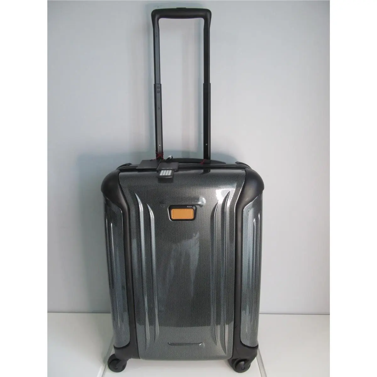 Vapor International Carry On Spinner 22 Forest Green Diamond by Tumi