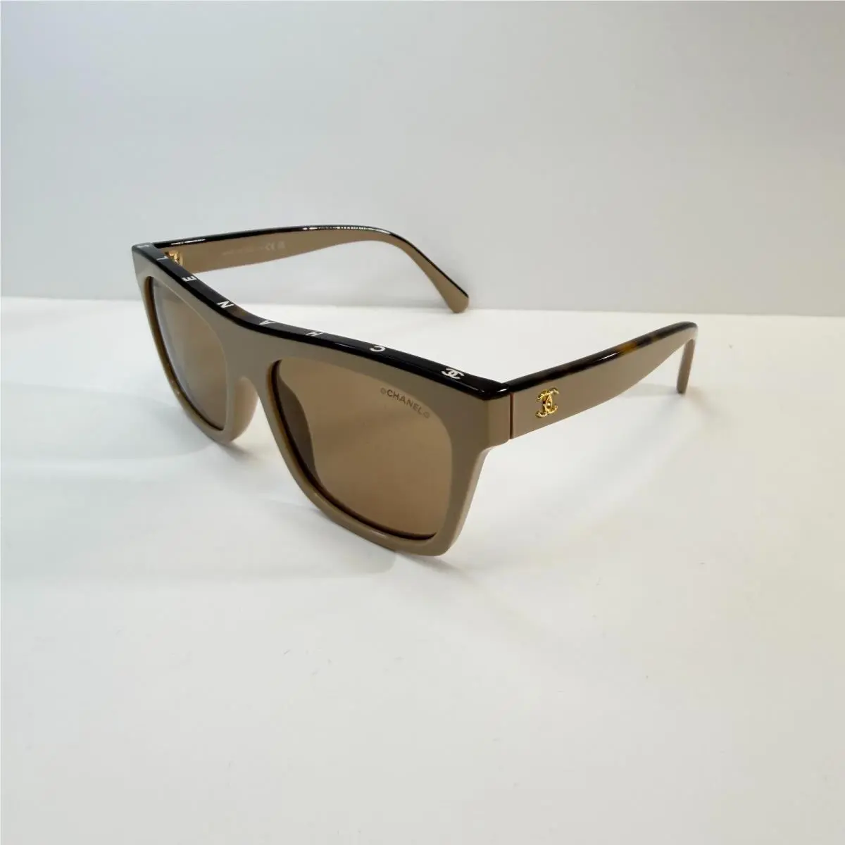 CH 5569 1520/63 Beige Frame w/ Light Brown Lenses by Chanel