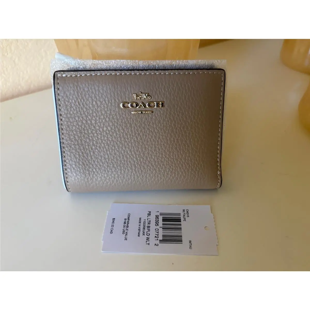 Coach Pebbled Leather Bifold Wallet Taupe CM315