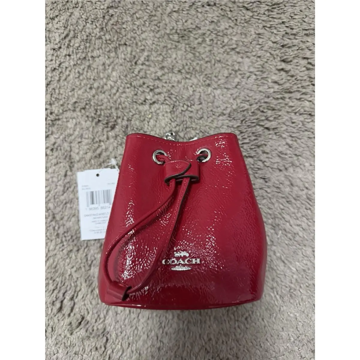Women’s Coach CZ028 Drawstring Wristlet Pouch Bag in Silver /red Patent Leather