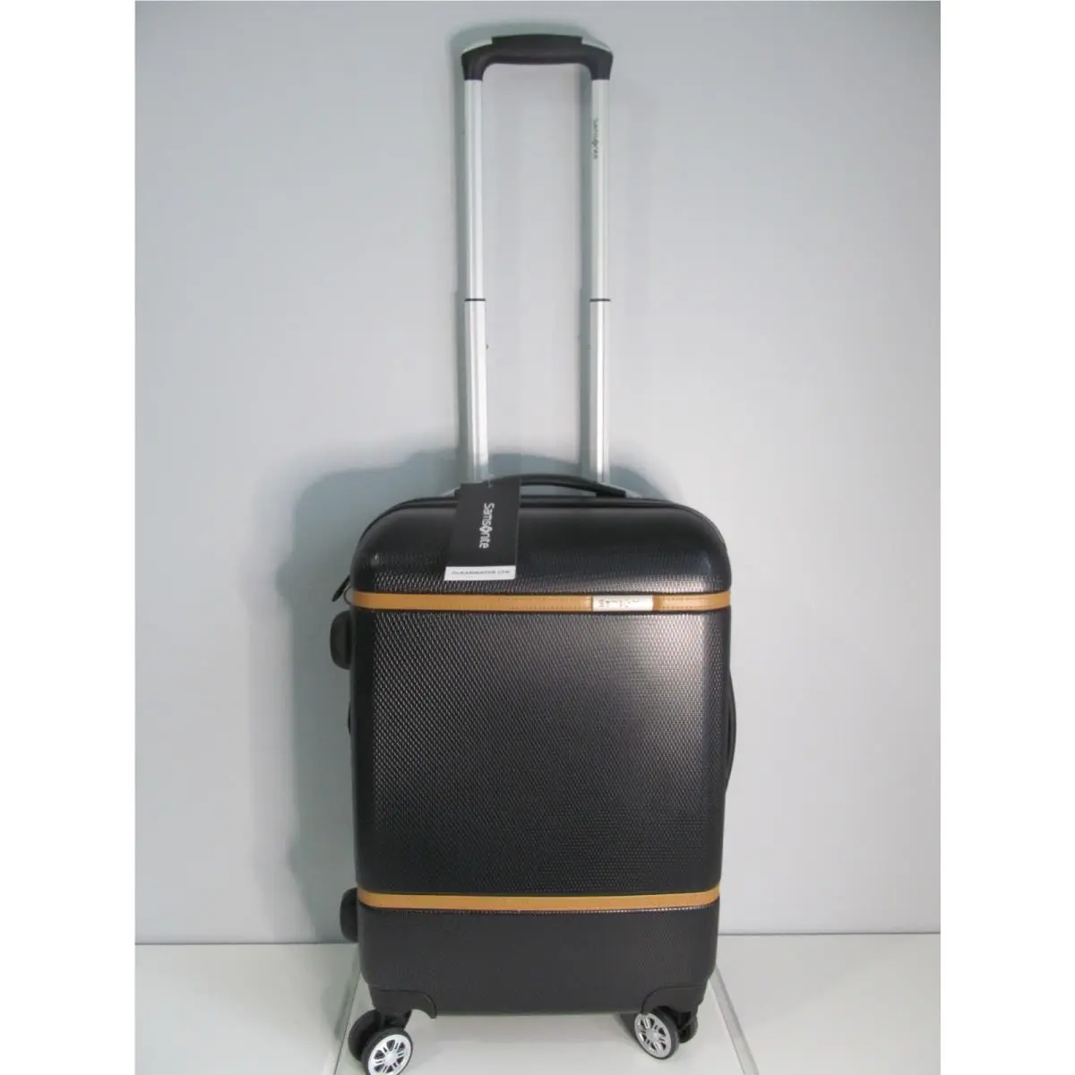 Luggage Black 22 Carry On Spinner with British Saddle Accents by Samsonite