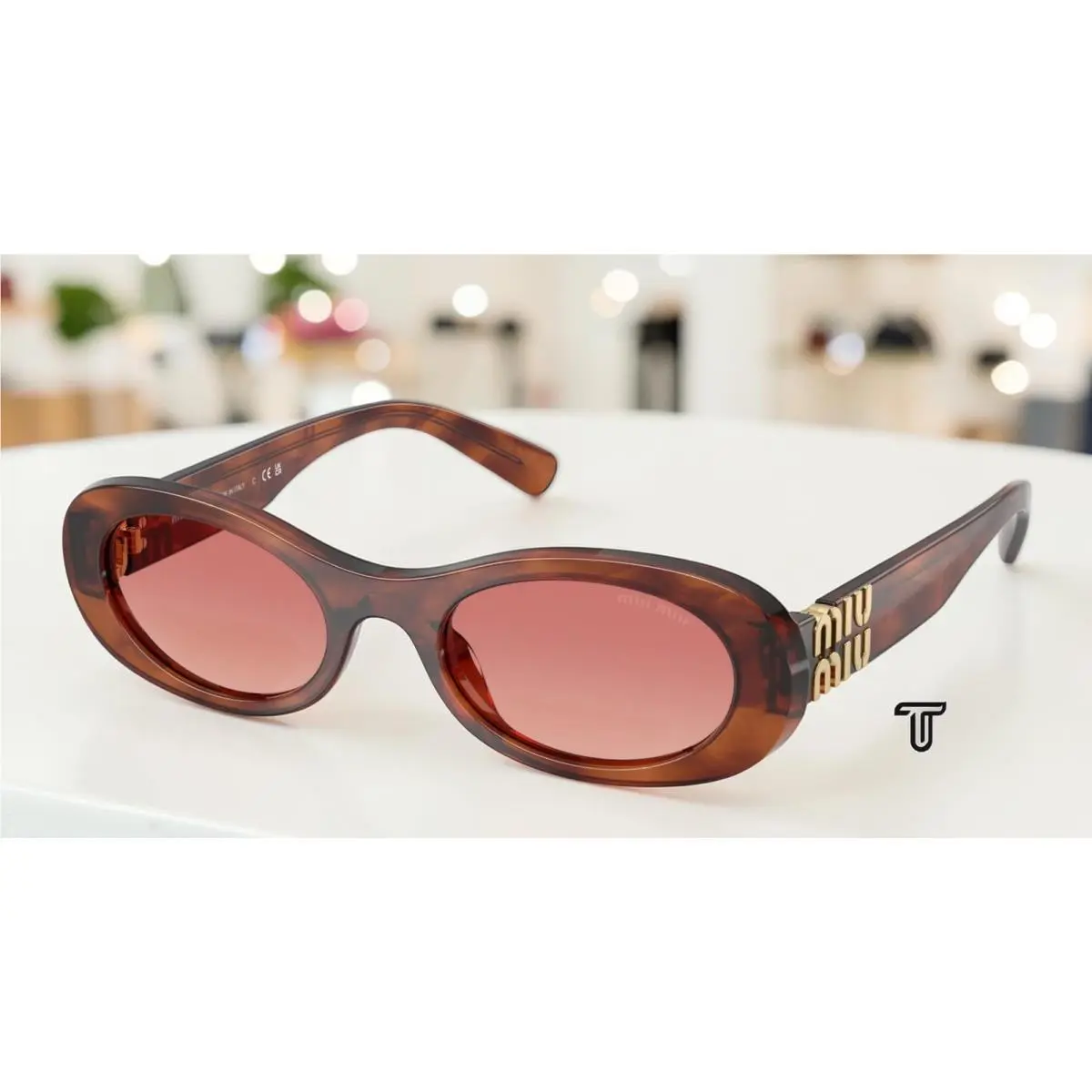 Miu Miu MU 06ZS 26E50U Striped Tobacco Etruscan 50 mm Women`s Sunglasses