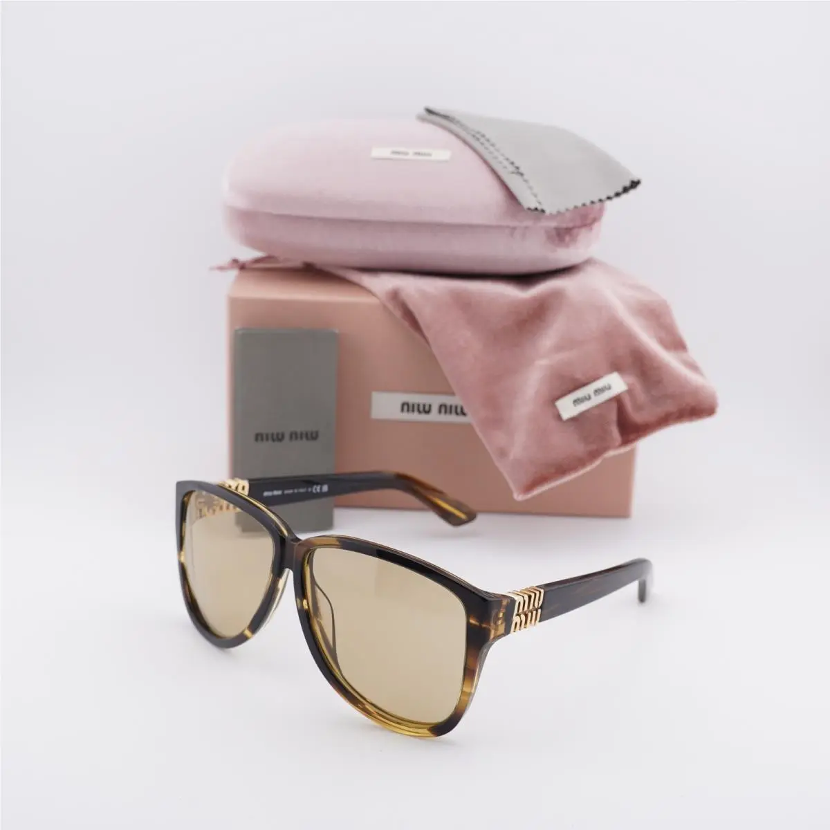 MU A08S 25E1OR Striped Havana/yellow 61-12-140 Sunglasses by Miu Miu