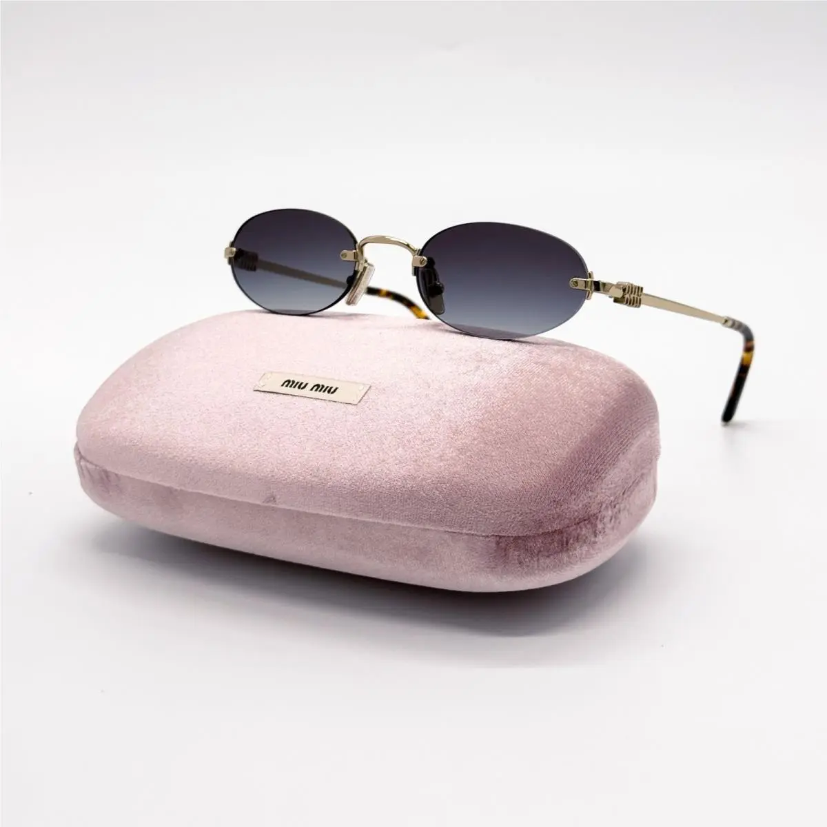 Miu Miu MU A54S Sunglasses Oval Gray Gold MUA54S ZVN5D1