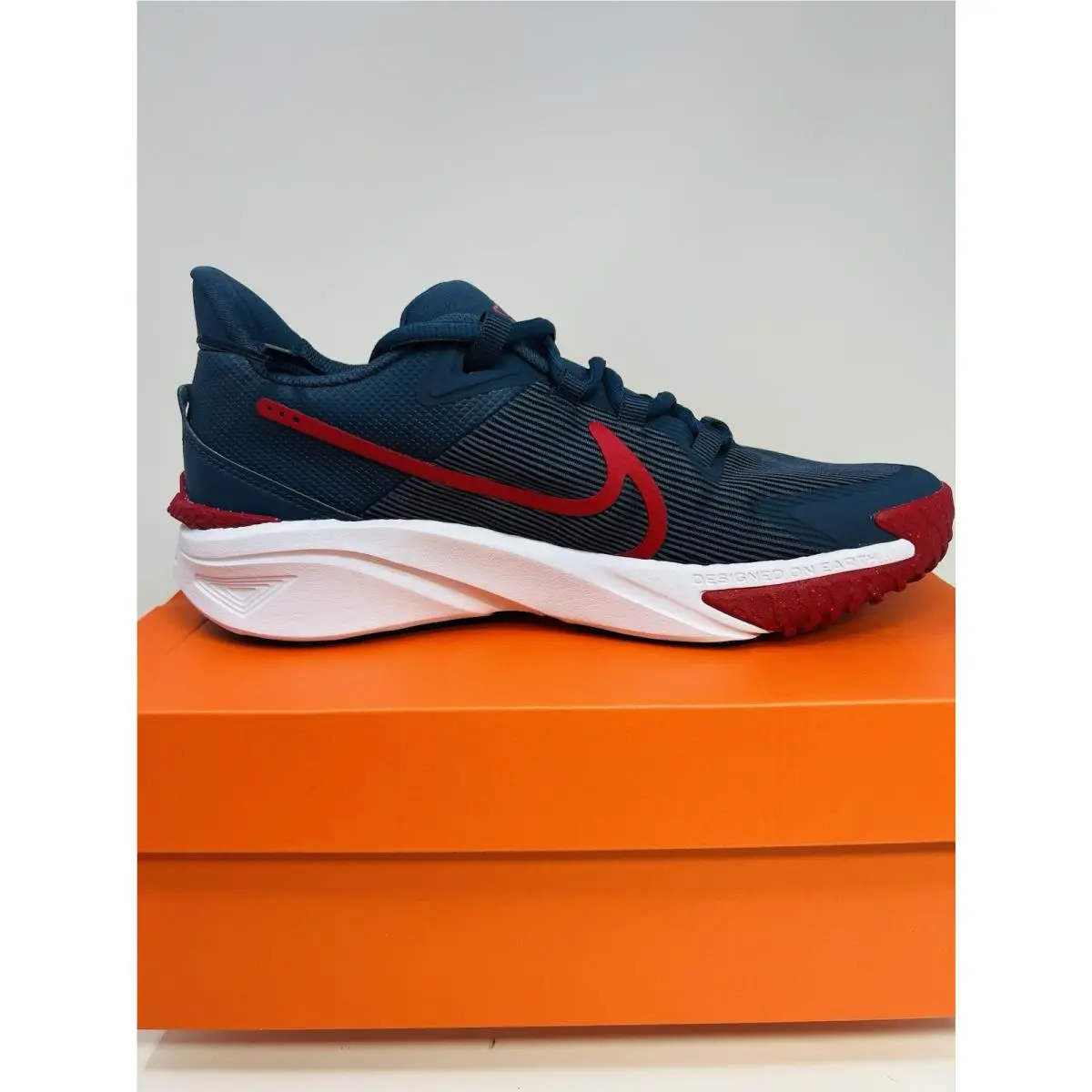 Nike shoes - Star Runner 4 NN (GS) Designed On Earth - DX7615-406 - Thunder Blue / Gym Red-Black (UPC: 0197601396110) 0