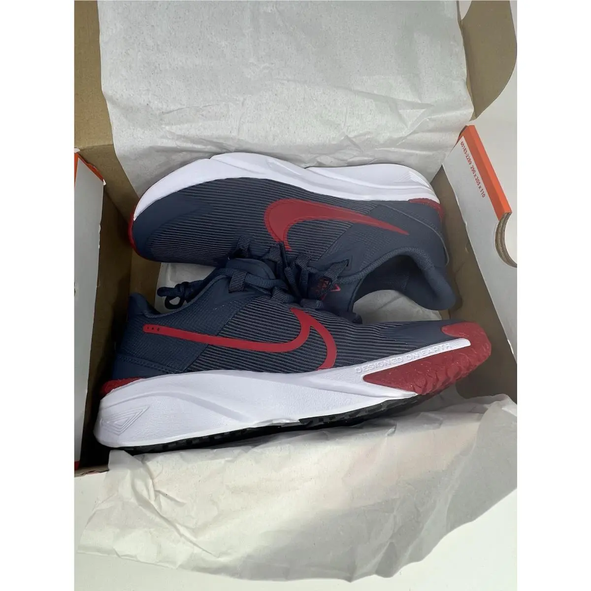Nike shoes - Star Runner 4 NN (GS) Designed On Earth - DX7615-406 - Thunder Blue / Gym Red-Black (UPC: 0197601396110) 1