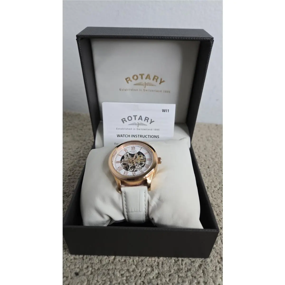 Never Worn Rotary Womens Automatic Skeleton White Leather Band Watch 009314