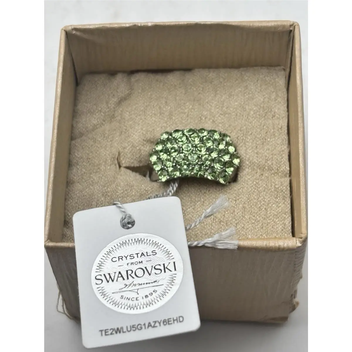 Green Crystals Ring Set in a Silver Tone Band - Ring Size 7.25 by Swarovski