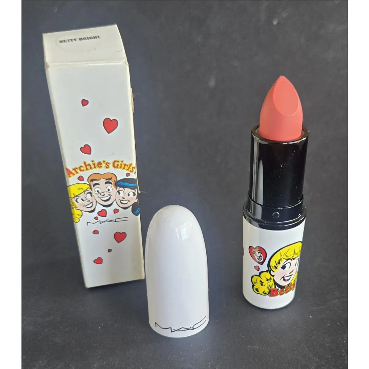 Mac Archie’s Girls Betty Bright Satin Lipstick White Packaging