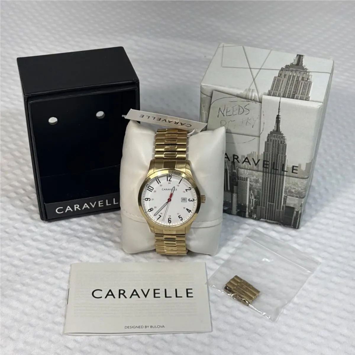 Caravelle by Bulova Men`s Watch 44B117 Quartz White Dial Gold Tone Stretch Band