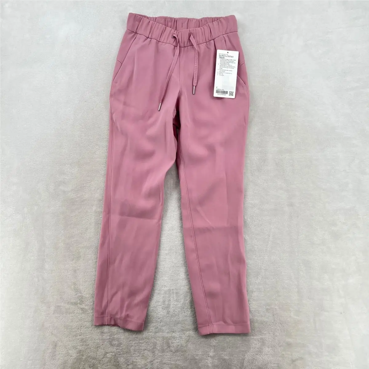 Lululemon On The Fly 7/8 Pant Mauve Woven Stretch Mid Rise Women Sz 2