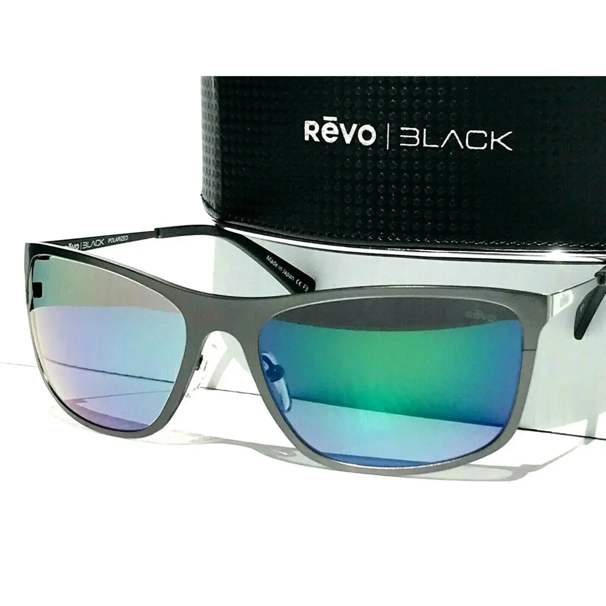 Sunglasses Meridian Gunmetal Frame / Evergreen Polarized Photochromic Lens by Revo