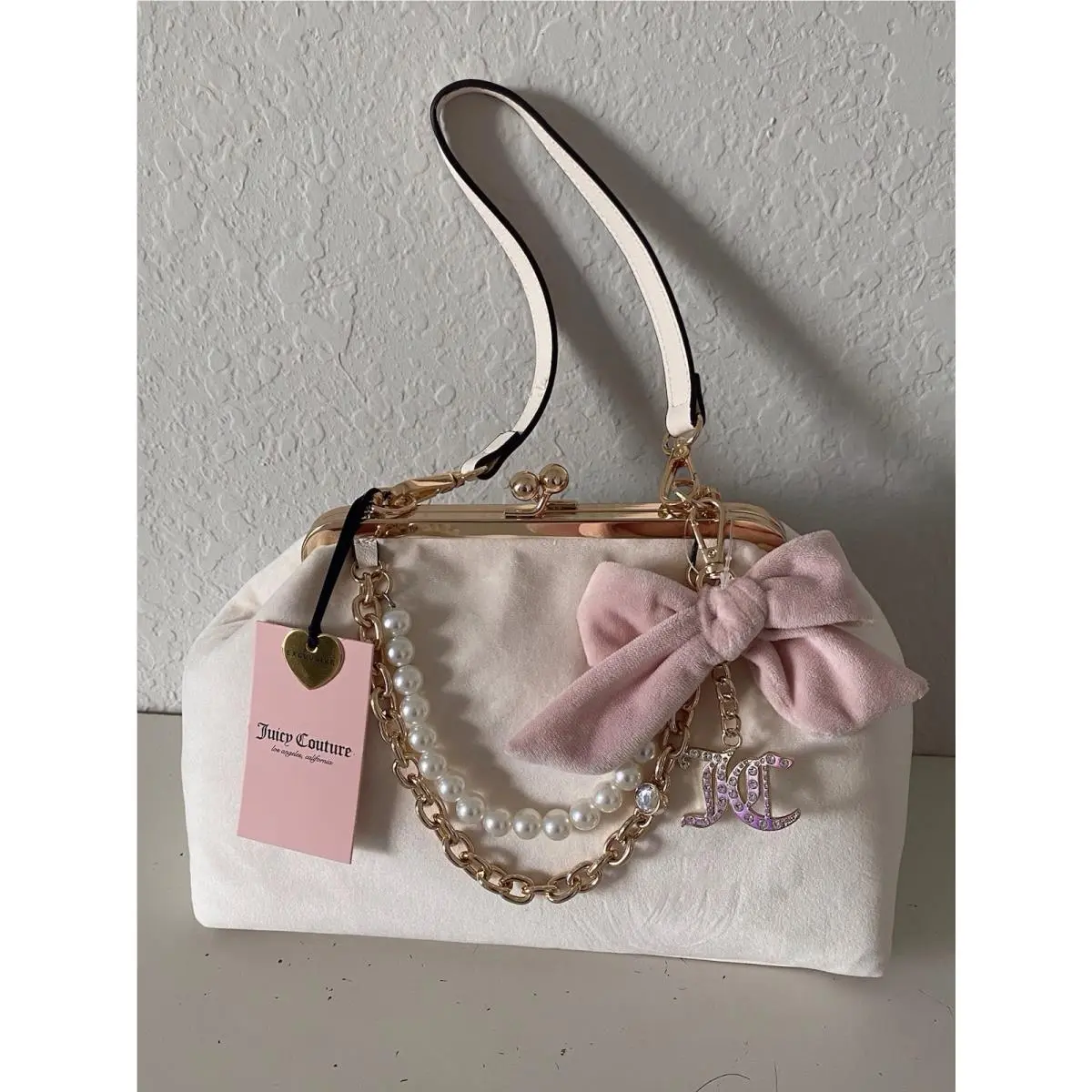 Fashion Items Haus Frame Clutch Shoulder Bag Soft White Bow Charm by Juicy Couture