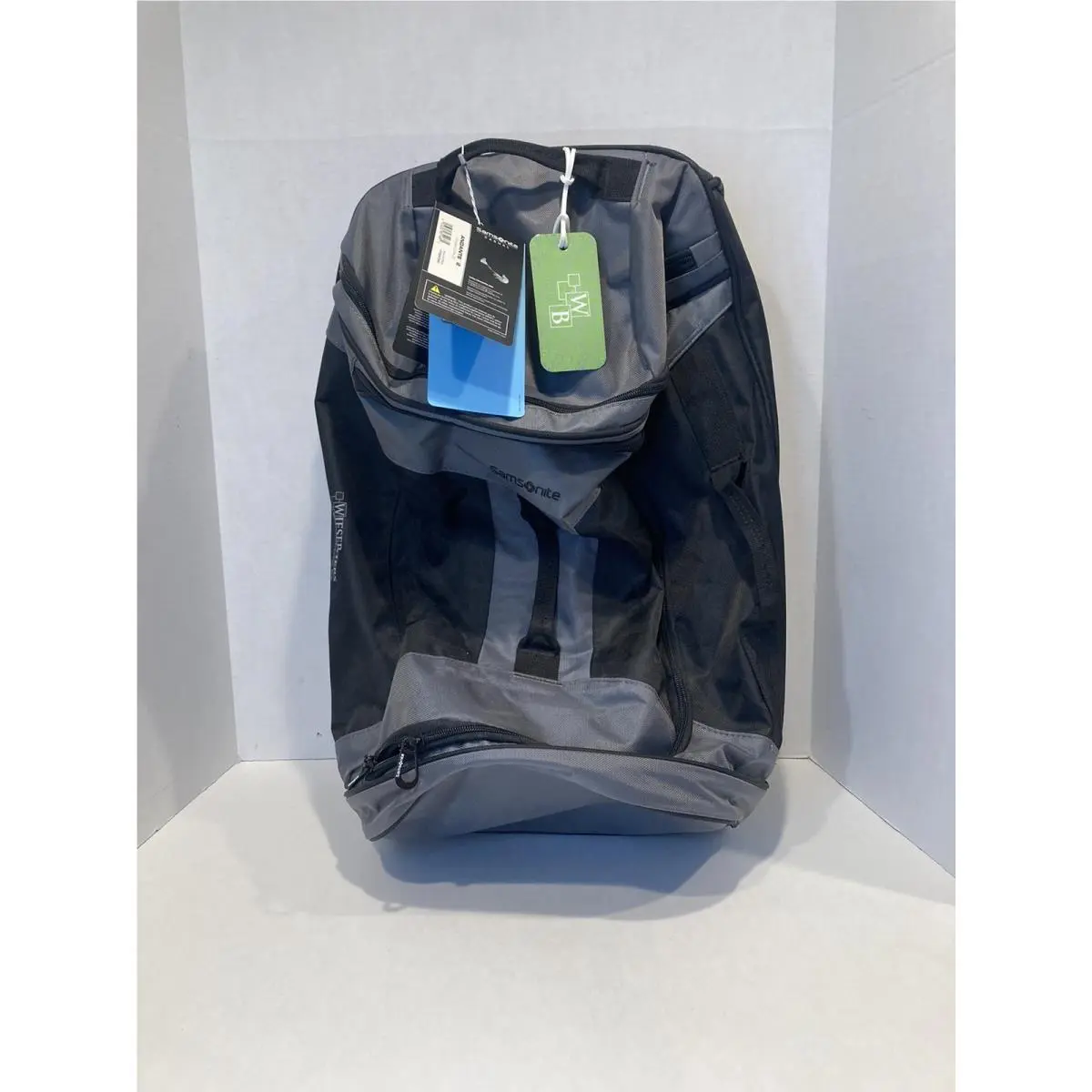 Andante 2 Wheeled Rolling Duffel Bag Gray Black 22 Inch Read by Samsonite