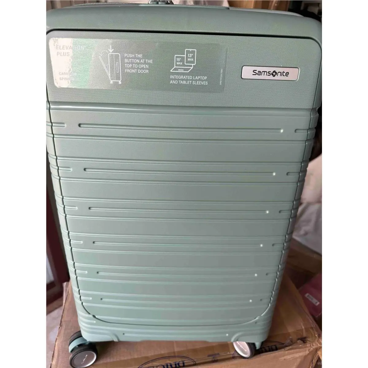 Elevation Plus Spinner Carry On 23 Green Hard Case Luggage by Samsonite
